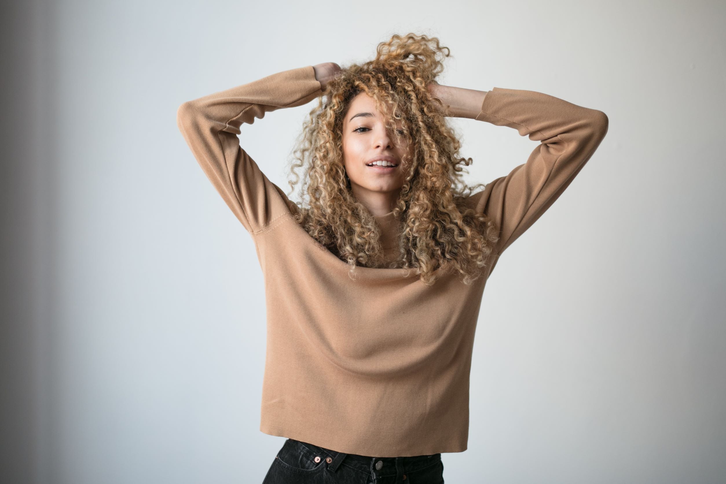 Girl with brown curly hair