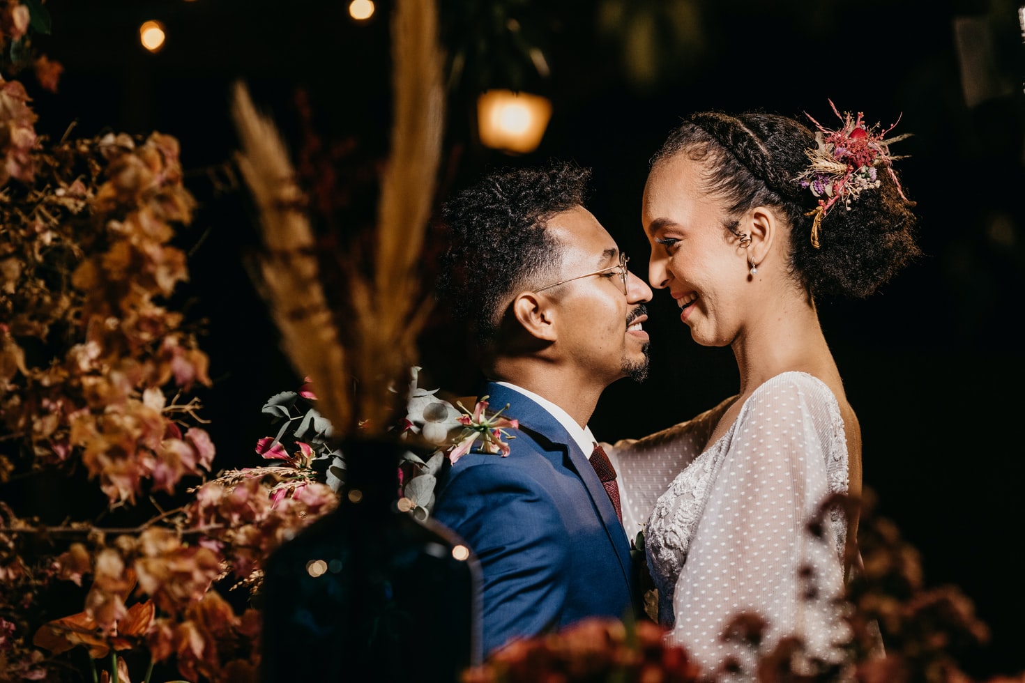 Bride and groom, the bride has a natural curly hair wedding styles